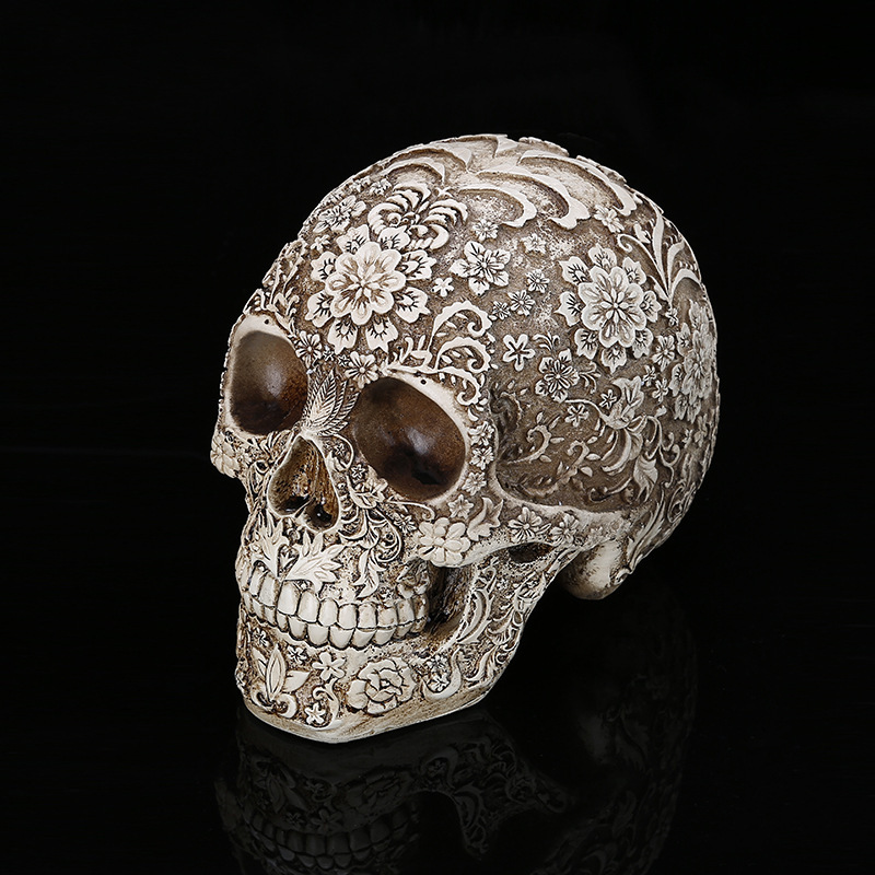 Carved Resin Skull Statue